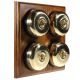 4 Gang 2 Way Period Asbury Medium Oak Wood - Polished Brass Dome Light Switch Black Pattress