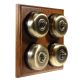 4 Gang 2 Way Period Asbury Medium Oak Wood - Smooth Dome Light Switch Black pattress