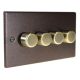 Accord raised plate 4G 2W LED Dimmer Switch with a Copper Bronze finish with Antique Brass Dimmer caps