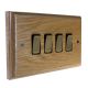 Wood 4 Gang 2Way 10Amp Antique Brass Rocker Switch in Solid Limed Oak