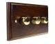 Wood 3 Gang 2Way Push on/Push off 3 x 250W/VA Dimmer Switch in Solid Dark Oak with Polished Brass dimmer caps