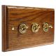 Period Wood 3G 2Way 10A Polished Brass Toggle Switch in Medium Oak