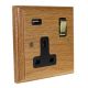 Classic 1G USB Charging Socket in Solid Oak with Polished Brass Rocker and Black Trim