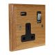 Classic 1G USB Charging Socket in Solid Oak with Polished Chrome Rocker and Black Trim.