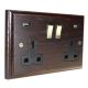 Classic 2G USB Charging Socket in Solid Dark Oak with Polished Brass Rocker and Black trim