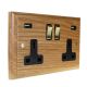 Classic 2G USB Charging Socket in Solid Oak with Polished Brass Rocker and Black trim