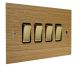 Solo Flat Plate Wood 4 Gang 2Way 10Amp Rocker Switch in  Oak with Polished Brass Rocker and Black trim