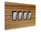 Solo Flat Plate Wood 4 Gang 2Way 10Amp Rocker Switch in Zebrano with Polished Stainless Rocker and Black Trim