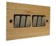 Solo Flat Plate Wood 6 Gang 2Way 10Amp Rocker Switch in  Oak with Antique Brass Rocker and Black Trim