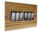 Solo Flat Plate Wood 6 Gang 2Way 10Amp Rocker Switch in Zebrano with Polished Stainless Rocker and Black Trim