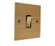 Solo Flat Plate Wood 1 Gang Intermediate(3way switching) Rocker Switch in  Oak with Polished Brass Rocker and Black trim