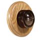 Brown Bakelite Push to Make 1G Dolly Switch on a round solid light oak base