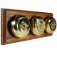 3 gang 2 Way Period Asbury Horizontal Medium Oak Wood - Polished Brass Dome Light Switch Black Pattress