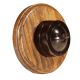 Brown Bakelite Push to Make 1G Dolly Switch on a round solid medium oak base